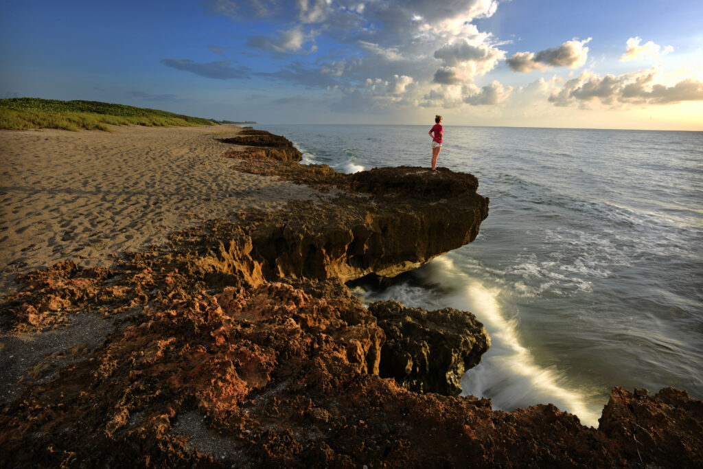 Woman standing near ocean