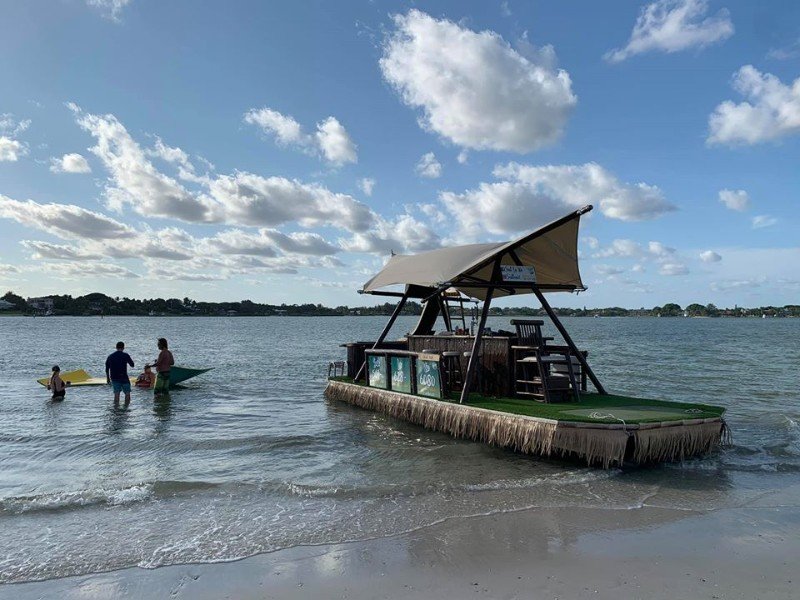 Floating Tiki Bar "Sail La Vie" on the open waters of Stuart, Florida