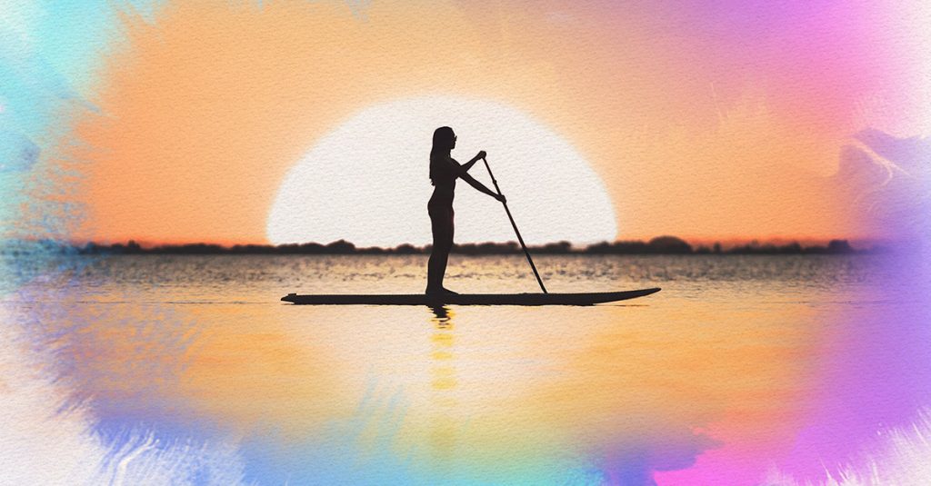 Paddleboarding at sunset