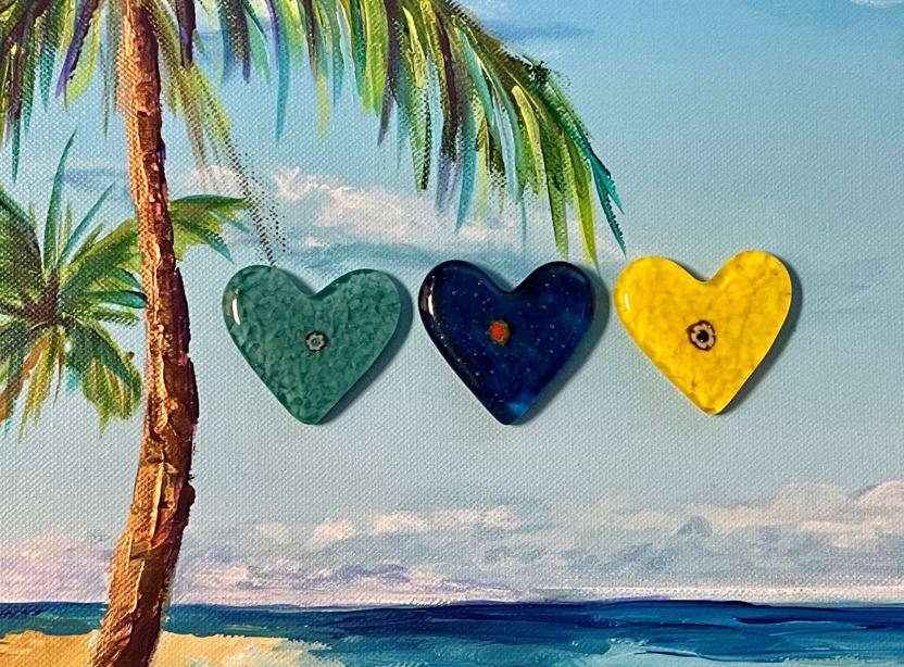 Scavenger Hunt Expansion - 3 Heart Sculptures over the Ocean