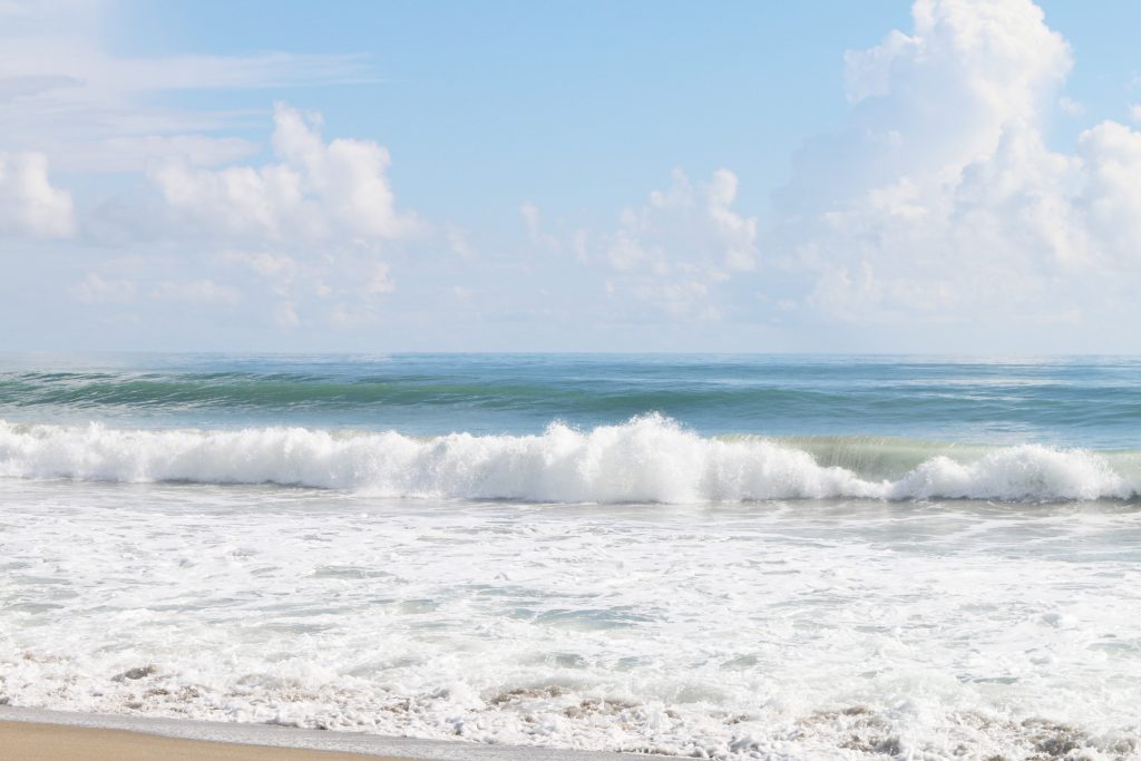 waves crashing on beach