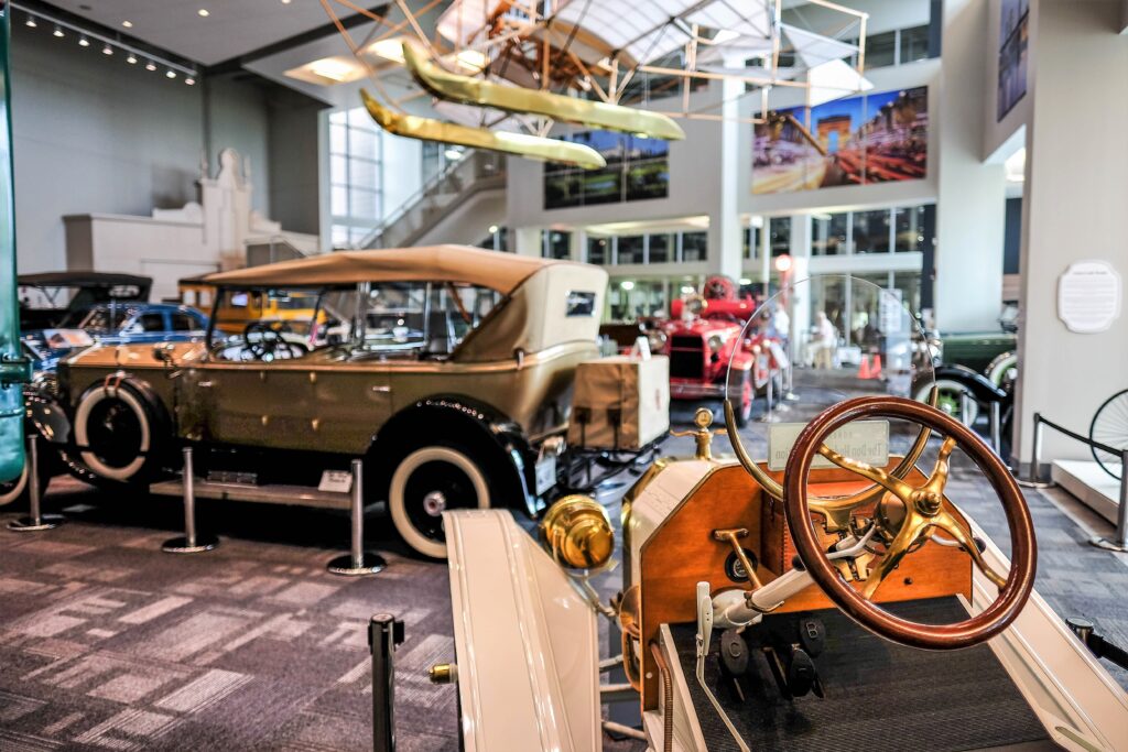 vintage cars and rare automobiles on display inside the Elliott Museum