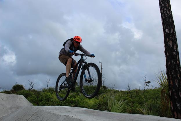 Catching air on the trail.