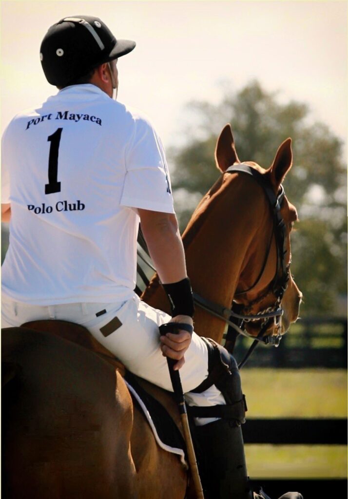 polo club member on horse
