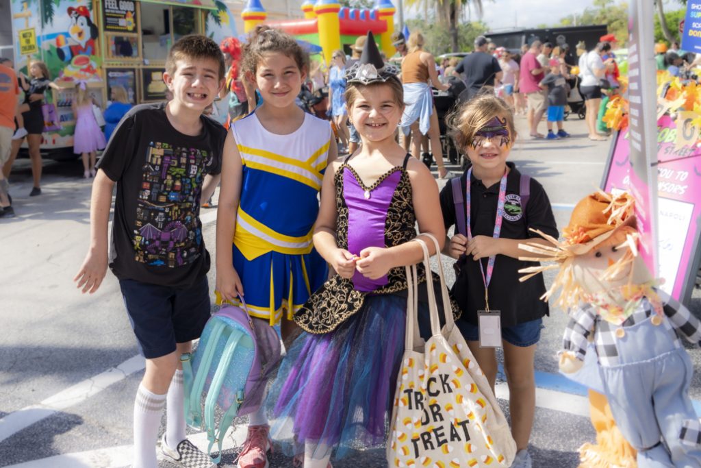 Group of children in Halloween costumes at Hobgoblins on Main